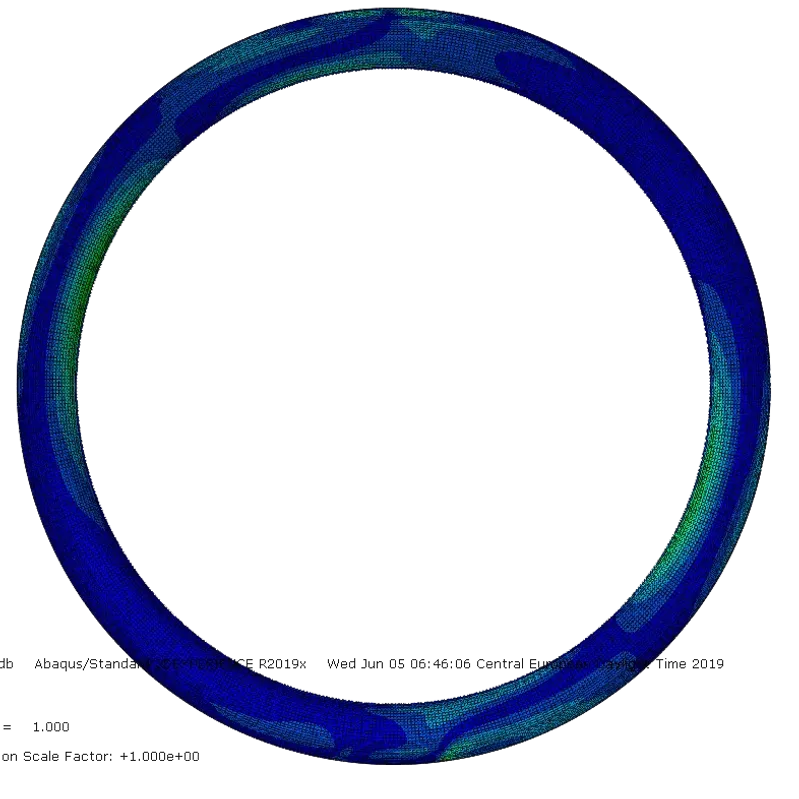 Finite Element Analysis (FEA) simulation showing stress distribution (blue to green) on a Venn carbon rim under load