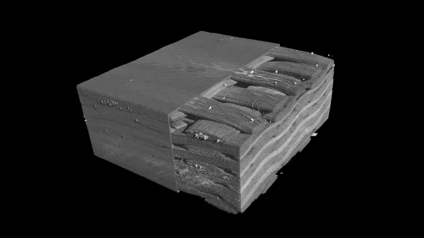 Microscopic view or simulation showing carbon fiber composite layers